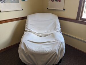 Our treatment chairs are covered in plastic, and they are sanitized before and after every patient.